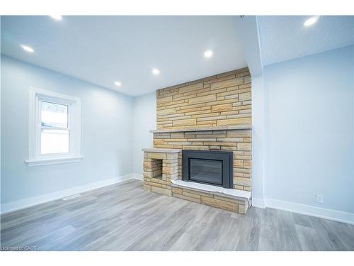 10 Monroe Street, Cambridge, ON - Indoor Photo Showing Living Room With Fireplace