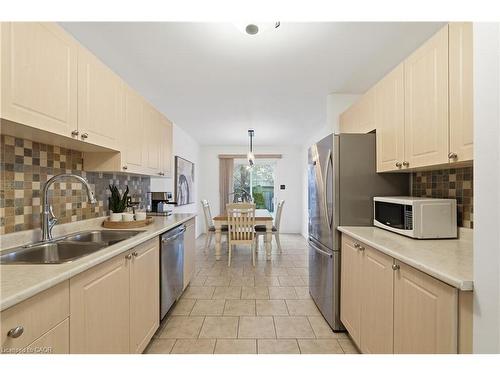 122 Vennio Lane, Hamilton, ON - Indoor Photo Showing Kitchen With Double Sink