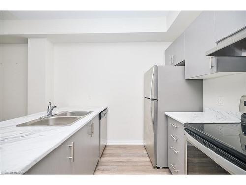 7-5016 Serena Drive, Beamsville, ON - Indoor Photo Showing Kitchen With Double Sink