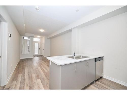 7-5016 Serena Drive, Beamsville, ON - Indoor Photo Showing Kitchen With Double Sink