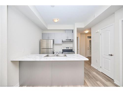 7-5016 Serena Drive, Beamsville, ON - Indoor Photo Showing Kitchen With Double Sink