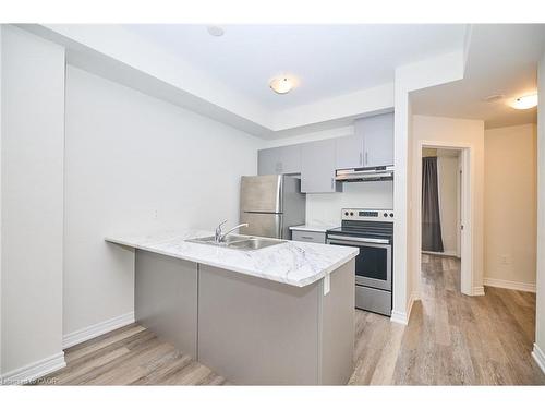 7-5016 Serena Drive, Beamsville, ON - Indoor Photo Showing Kitchen With Stainless Steel Kitchen With Double Sink