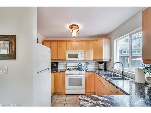8 Beach Road, Lowbanks, ON - Indoor Photo Showing Kitchen With Double Sink