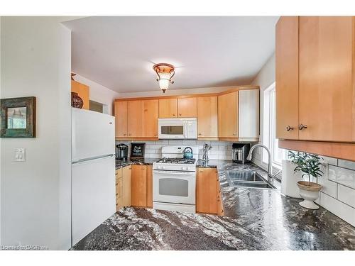 8 Beach Road, Lowbanks, ON - Indoor Photo Showing Kitchen With Double Sink