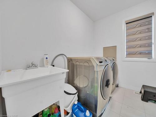 30 Times Square Boulevard, Hamilton, ON - Indoor Photo Showing Laundry Room
