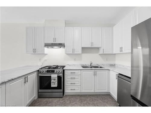 11 Harwood Street, Tillsonburg, ON - Indoor Photo Showing Kitchen With Double Sink