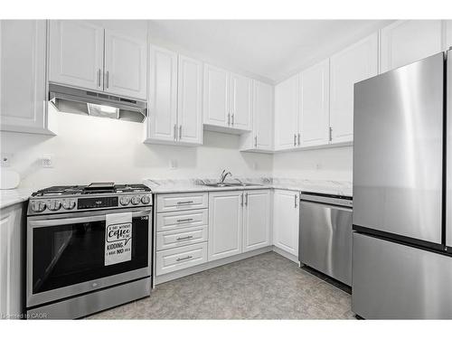 11 Harwood Street, Tillsonburg, ON - Indoor Photo Showing Kitchen With Double Sink