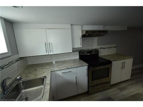 2-2176 Queensway Drive, Burlington, ON - Indoor Photo Showing Kitchen With Double Sink