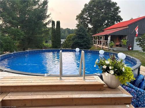 657 Windham Road 14, Simcoe, ON - Outdoor With Above Ground Pool