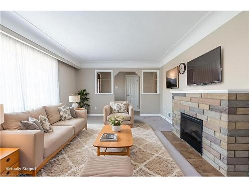 173 West 23Rd Street, Hamilton, ON - Indoor Photo Showing Living Room With Fireplace