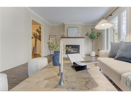 F-88 Mcdougall Road, Waterloo, ON - Indoor Photo Showing Living Room With Fireplace