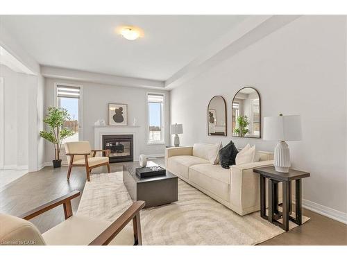 478 Robert Woolner Street, Ayr, ON - Indoor Photo Showing Living Room With Fireplace