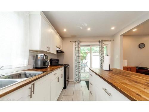 13 Robins Avenue, Hamilton, ON - Indoor Photo Showing Kitchen With Double Sink