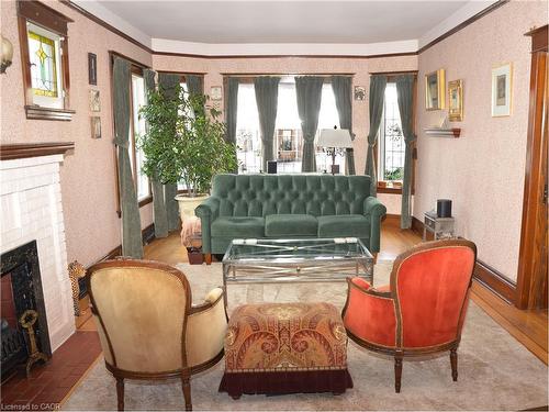 25 Fairmount Avenue, Hamilton, ON - Indoor Photo Showing Living Room With Fireplace