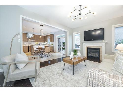 19 Mcknight Avenue, Waterdown, ON - Indoor Photo Showing Living Room With Fireplace