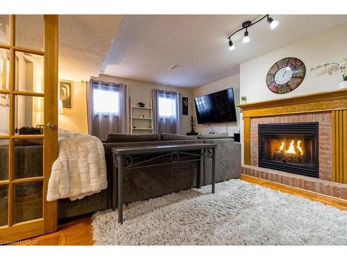 59 Acadia Drive, Welland, ON - Indoor Photo Showing Living Room With Fireplace