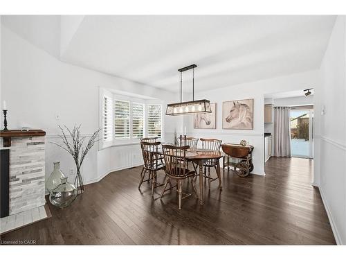 1-2230 Walkers Line, Burlington, ON - Indoor Photo Showing Other Room With Fireplace