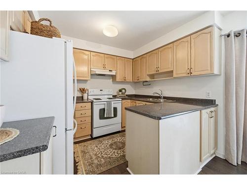 1-2230 Walkers Line, Burlington, ON - Indoor Photo Showing Kitchen With Double Sink