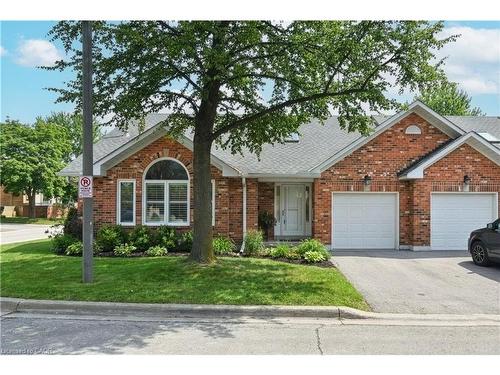 1-2230 Walkers Line, Burlington, ON - Outdoor With Facade