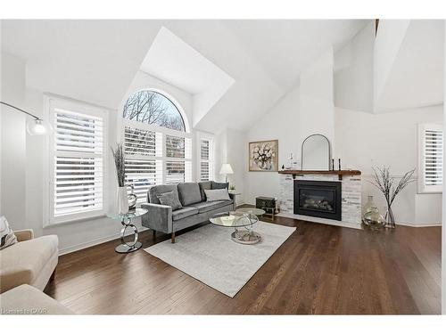 1-2230 Walkers Line, Burlington, ON - Indoor Photo Showing Living Room With Fireplace
