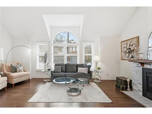 1-2230 Walkers Line, Burlington, ON - Indoor Photo Showing Living Room With Fireplace