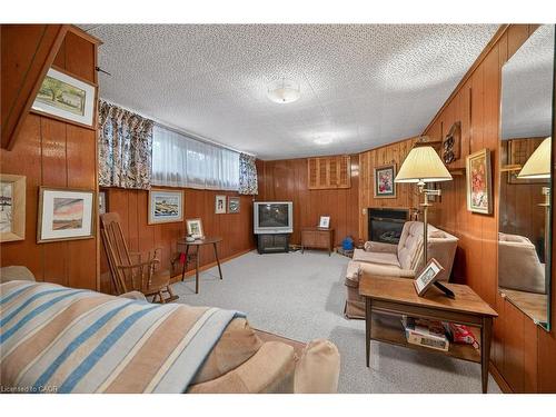 59 Cloke Court, Hamilton, ON - Indoor Photo Showing Bedroom With Fireplace