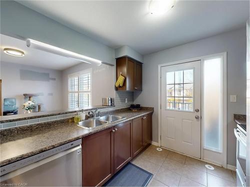 597 Speyer Circle, Milton, ON - Indoor Photo Showing Kitchen With Double Sink