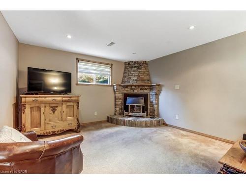 2 Falls Crescent, Simcoe, ON - Indoor Photo Showing Living Room With Fireplace