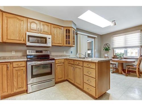 2 Falls Crescent, Simcoe, ON - Indoor Photo Showing Kitchen With Double Sink
