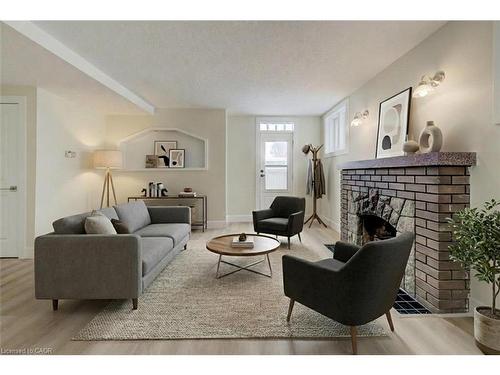 155 Wellington Street N, Kitchener, ON - Indoor Photo Showing Living Room With Fireplace