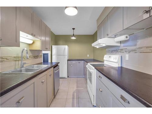 809-225 Harvard Place, Waterloo, ON - Indoor Photo Showing Kitchen With Double Sink
