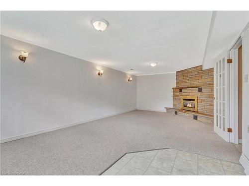 528 Havelock Drive, Waterloo, ON - Indoor Photo Showing Other Room With Fireplace