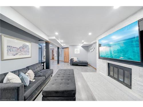 22 Caswell Drive, Hamilton, ON - Indoor Photo Showing Living Room With Fireplace