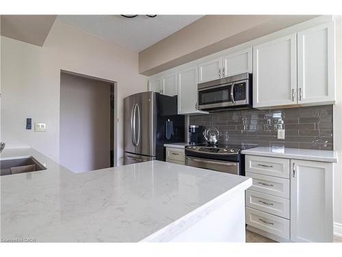 305-3497 Upper Middle Road, Burlington, ON - Indoor Photo Showing Kitchen With Stainless Steel Kitchen With Double Sink