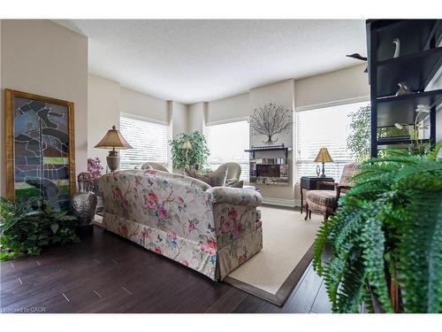 305-3497 Upper Middle Road, Burlington, ON - Indoor Photo Showing Living Room With Fireplace