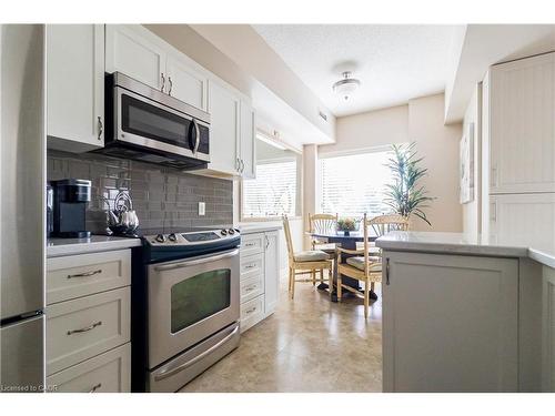 305-3497 Upper Middle Road, Burlington, ON - Indoor Photo Showing Kitchen With Stainless Steel Kitchen
