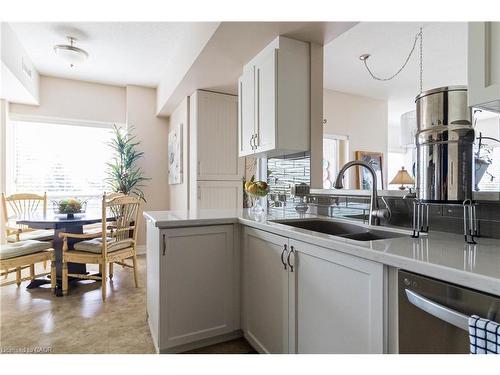 305-3497 Upper Middle Road, Burlington, ON - Indoor Photo Showing Kitchen With Double Sink