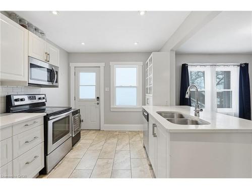 34 Balsam Avenue N, Hamilton, ON - Indoor Photo Showing Kitchen With Double Sink