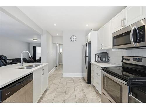 34 Balsam Avenue N, Hamilton, ON - Indoor Photo Showing Kitchen With Double Sink
