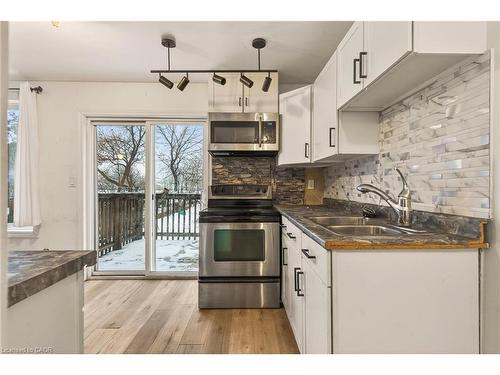 218 East 8Th Street, Hamilton, ON - Indoor Photo Showing Kitchen With Double Sink