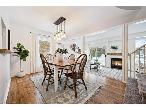 4 Northmanor Crescent, Kitchener, ON - Indoor Photo Showing Dining Room With Fireplace