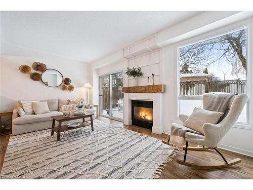 4 Northmanor Crescent, Kitchener, ON - Indoor Photo Showing Living Room With Fireplace