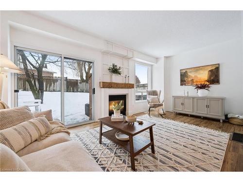 4 Northmanor Crescent, Kitchener, ON - Indoor Photo Showing Living Room With Fireplace