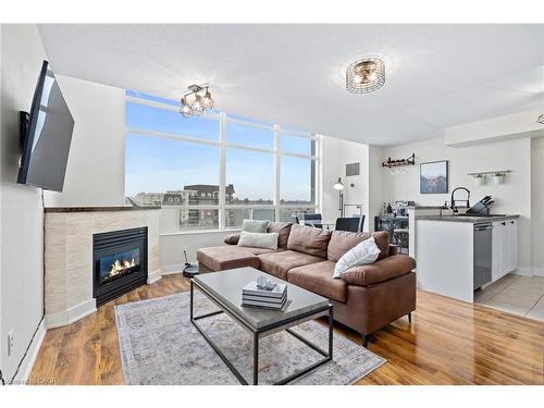 433-200 Manitoba Street, Toronto, ON - Indoor Photo Showing Living Room With Fireplace