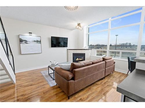 433-200 Manitoba Street, Toronto, ON - Indoor Photo Showing Living Room With Fireplace
