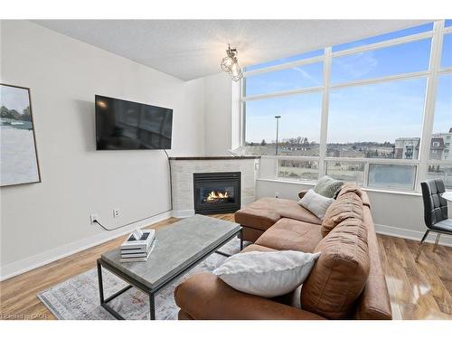433-200 Manitoba Street, Toronto, ON - Indoor Photo Showing Living Room With Fireplace