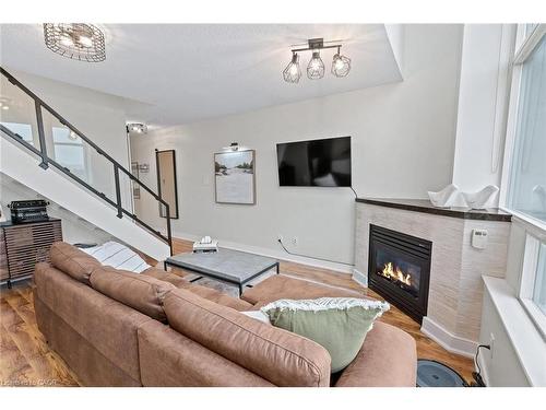 433-200 Manitoba Street, Toronto, ON - Indoor Photo Showing Living Room With Fireplace