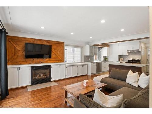 11 Scotia Avenue, Hamilton, ON - Indoor Photo Showing Living Room With Fireplace
