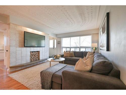 156 Rainbow Drive, Hamilton, ON - Indoor Photo Showing Living Room With Fireplace