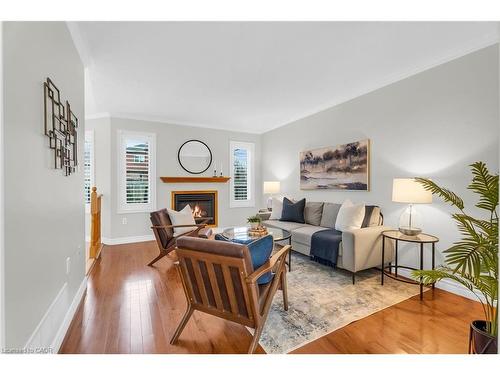 91 Samuel Crescent, Georgetown, ON - Indoor Photo Showing Living Room With Fireplace